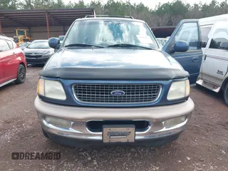 1998 Ford Expedition XLT with VIN 1FMRU17L1WLA99979, listed as a IAAI auction lot 41569667 with 215,937 mi miles. Bid and sale history available at carsss.com. Image 6.