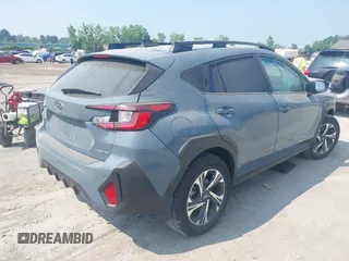 2024 Subaru Crosstrek Premium with VIN JF2GUADC9RH202736, listed as a IAAI auction lot 42735432 with 7,100 mi miles and . Bid and sale history available at DreamBid. Image 4.