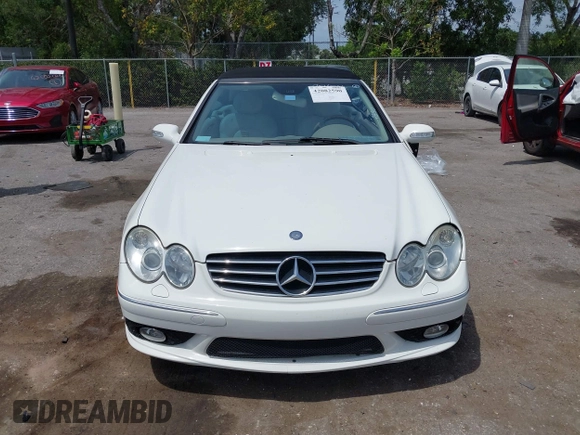 2005 Mercedes-Benz CLK 5.0L with VIN WDBTK75J55F123328, listed as a IAAI auction lot 42082590 with 58,969 mi miles. Bid and sale history available at carsss.com. Image 12.
