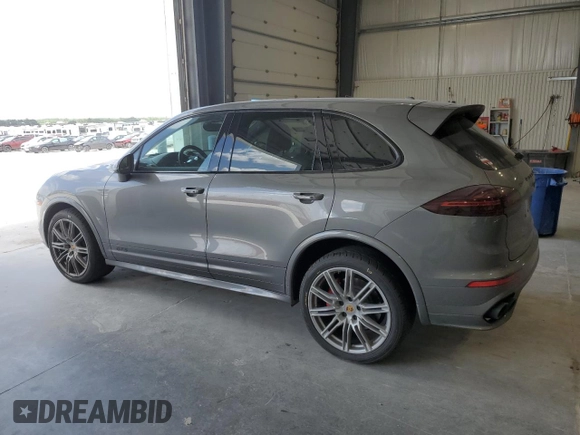2016 Porsche Cayenne GTS с VIN WP1AD2A2XGLA80001, выставлен на аукционе Copart как лот 56706455 с пробегом 71 816 миль миль и Списание • Salvage title. История ставок и продаж доступна на DreamBid. Изображение 2.