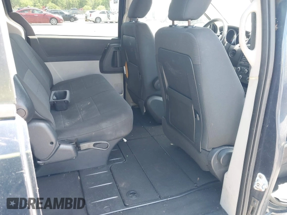 2008 Dodge Grand Caravan SE with VIN 1D8HN44H98B127746, listed as a IAAI auction lot 41987770 with 173,782 mi miles and . Bid and sale history available at DreamBid. Image 8.