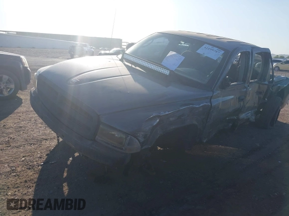2002 Dodge Dakota with VIN 1B7HG38Z62S553505, listed as a IAAI auction lot 42499787 with 356,218 mi miles and . Bid and sale history available at DreamBid. Image 2.