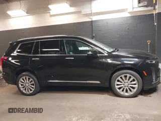 2020 Cadillac XT6 AWD Premium Luxury with VIN 1GYKPDRSXLZ111021, listed as a IAAI auction lot 37922511 with 54,755 mi miles and . Bid and sale history available at DreamBid. Image 13.