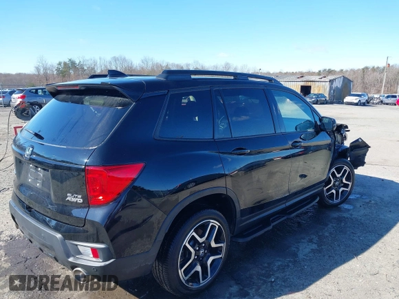 2023 Honda Passport Elite with VIN 5FNYF8H04PB006514, listed as a IAAI auction lot 41537826 with 14,640 mi miles and . Bid and sale history available at DreamBid. Image 4.