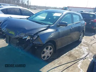 2009 Toyota Matrix with VIN 2T1KU40EX9C084721, listed as a IAAI auction lot 41748177 with 148,374 mi miles. Bid and sale history available at carsss.com. Image 17.