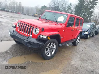 2020 Jeep Wrangler Unlimited Sahara with VIN 1C4HJXEN3LW232316, listed as a IAAI auction lot 42009794 with 35,535 mi miles. Bid and sale history available at carsss.com. Image 2.