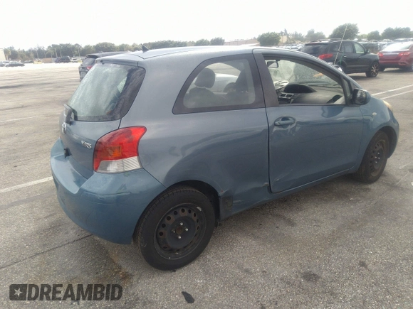 2010 Toyota Yaris with VIN JTDJT4K39A5295243, listed as a IAAI auction lot 41784428 with 92,354 mi miles. Bid and sale history available at carsss.com. Image 4.