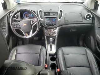 2016 Chevrolet Trax LTZ with VIN KL7CJRSB2GB562166, listed as a Copart auction lot 50413105 with 57,058 mi miles and Salvage Title. Bid and sale history available at carsss.com. Image 8.