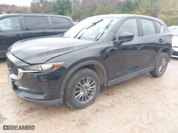 2017 Mazda CX-5 Sport with VIN JM3KFBBL5H0201857, listed as a IAAI auction lot 40885161 with 87,464 mi miles. Bid and sale history available at carsss.com. Image 19.