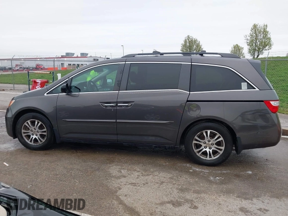 2012 Honda Odyssey EX-L with VIN 5FNRL5H6XCB032366, listed as a IAAI auction lot 41943625 with 73,236 mi miles and . Bid and sale history available at carsss.com. Image 14.