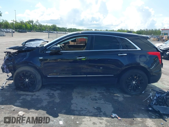 2018 Cadillac XT5 FWD with VIN 1GYKNARS2JZ160862, listed as a IAAI auction lot 42584234 with 152,785 mi miles and . Bid and sale history available at DreamBid. Image 15.