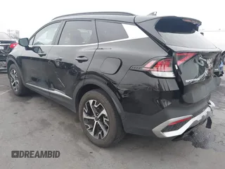 2023 Kia Sportage EX with VIN KNDPVCAG1P7043695, listed as a IAAI auction lot 42505834 with 16,192 mi miles and . Bid and sale history available at DreamBid. Image 3.