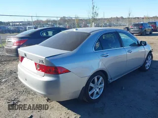 2005 Acura TSX with VIN JH4CL96955C005049, listed as a IAAI auction lot 40809563 with 140,000 mi miles. Bid and sale history available at carsss.com. Image 4.