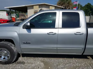 2015 Chevrolet Silverado 1500 LT with VIN 1GCRCREC5FZ333241, listed as a IAAI auction lot 42279944 with 126,473 mi miles and . Bid and sale history available at DreamBid. Image 14.
