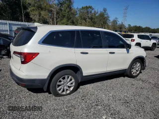 2019 Honda Pilot LX with VIN 5FNYF5H12KB006768, listed as a Copart auction lot 43393665 with 59,121 mi miles and Salvage Title. Bid and sale history available at DreamBid. Image 3.
