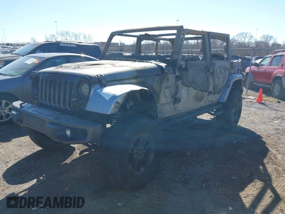 2017 Jeep Wrangler Unlimited Sahara с VIN 1C4BJWEG5HL546544, выставлен на аукционе IAAI как лот 41653288 с пробегом Не указан миль и . История ставок и продаж доступна на DreamBid. Изображение 2.
