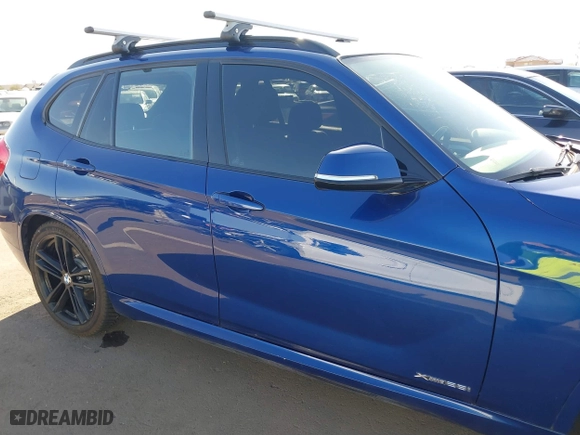2015 BMW X1 xDrive28i with VIN WBAVL1C56FVY32753, listed as a IAAI auction lot 41759454 with 130,823 mi miles. Bid and sale history available at carsss.com. Image 13.