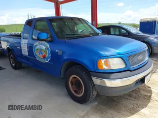 1999 Ford F-150 XL with VIN 1FTRX17L9XNB83680, listed as a IAAI auction lot 42636807 with Not provided miles and . Bid and sale history available at DreamBid. Image 1.