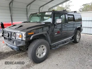2003 Hummer H2 with VIN 5GRGN23U33H118459, listed as a Copart auction lot 77765694 with 157,390 mi miles and Salvage Title. Bid and sale history available at carsss.com. Image 1.