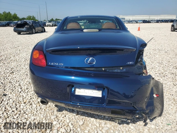 2004 Lexus SC 430 z VIN JTHFN48Y040056666, wystawiony jako Copart lot #55772965 z przebiegiem 128 381 mil mil oraz Szkoda całkowita • Salvage title. Historia ofert i sprzedaży dostępna na DreamBid. Obrazek 6.