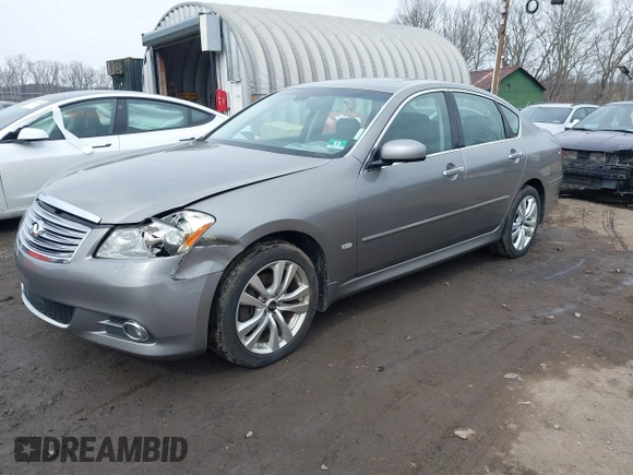 2010 Infiniti M with VIN JN1CY0AR0AM960483, listed as a IAAI auction lot 41619095 with 81,690 mi miles. Bid and sale history available at carsss.com. Image 2.