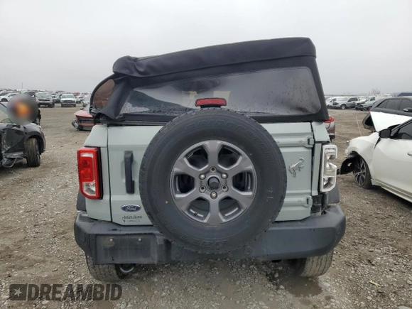 2021 Ford Bronco with VIN 1FMDE5BH9MLA96763, listed as a Copart auction lot 43749545 with 57,411 mi miles and Salvage Title. Bid and sale history available at DreamBid. Image 6.