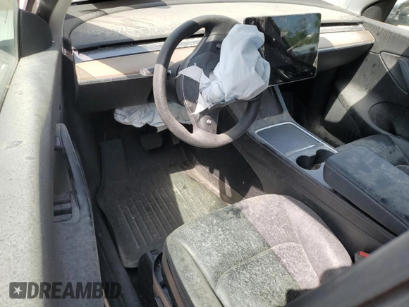2022 Tesla Model Y Long Range z VIN 7SAYGAEE8NF378457, wystawiony jako Copart lot #56696905 z przebiegiem Nie podano mil oraz Czysty tytuł • Clean title. Historia ofert i sprzedaży dostępna na DreamBid. Obrazek 8.