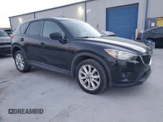 2014 Mazda CX-5 Grand Touring with VIN JM3KE4DY5E0386043, listed as a Copart auction lot 48866995 with 183,626 mi miles and Salvage Title. Bid and sale history available at DreamBid. Image 4.
