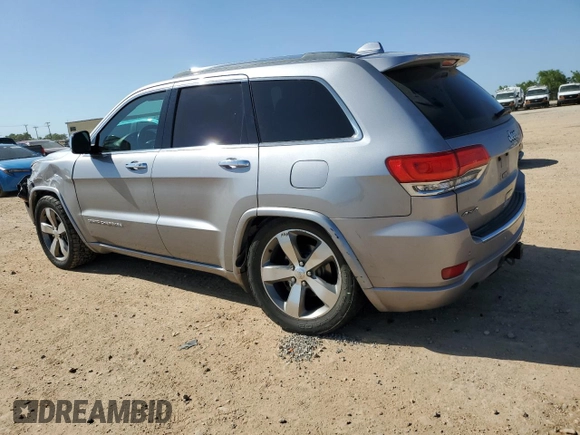 2014 Jeep Grand Cherokee Overland with VIN 1C4RJFCG7EC153156, listed as a Copart auction lot 52452925 with 152,348 mi miles and Salvage Title. Bid and sale history available at DreamBid. Image 2.