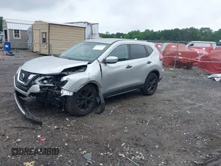 2017 Nissan Rogue SV with VIN KNMAT2MT7HP566140, listed as a IAAI auction lot 42507432 with 166,534 mi miles and . Bid and sale history available at DreamBid. Image 18.