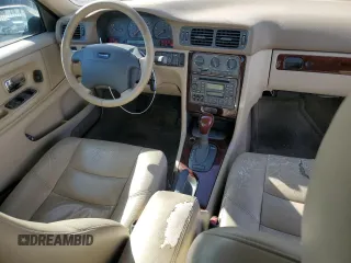2000 Volvo S70 z VIN YV1LS61J6Y2667537, wystawiony jako Copart lot #81875774 z przebiegiem 224 087 mil mil oraz Tytuł czysty. Historia ofert i sprzedaży dostępna na DreamBid. Obrazek 8.
