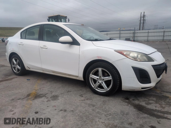 2011 Mazda Mazda3 i Sport with VIN JM1BL1UG4B1356610, listed as a Copart auction lot 52738565 with 134,950 mi miles and Salvage Title. Bid and sale history available at carsss.com. Image 4.