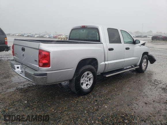 2005 Dodge Dakota SLT with VIN 1D7HE48N05S250870, listed as a Copart auction lot 48611265 with 73,177 mi miles and Salvage Title. Bid and sale history available at DreamBid. Image 3.