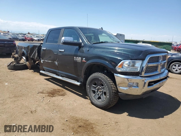 2015 Ram 2500 Laramie with VIN 3C6UR5KL5FG580725, listed as a Copart auction lot 61797534 with 214,156 mi miles and Salvage title. Bid and sale history available at DreamBid. Image 4.