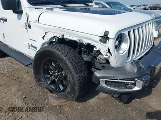2021 Jeep Wrangler Unlimited Sahara z VIN 1C4JJXP6XMW840844, wystawiony jako IAAI lot #42152271 z przebiegiem 68 209 mil mil oraz . Historia ofert i sprzedaży dostępna na DreamBid. Obrazek 6.