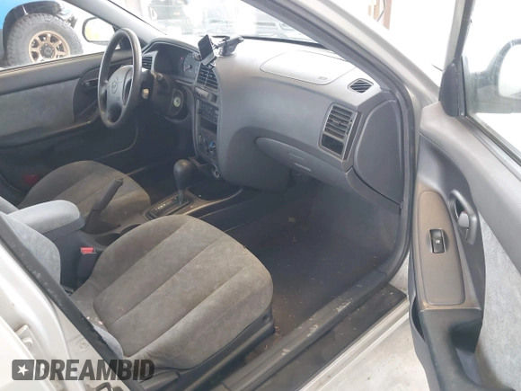 2002 Hyundai Elantra GLS z VIN KMHDN45D52U340239, wystawiony jako IAAI lot #42260604 z przebiegiem 288 297 mil mil oraz . Historia ofert i sprzedaży dostępna na DreamBid. Obrazek 5.