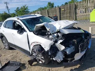 2021 Mazda CX-30 Premium with VIN 3MVDMBDL2MM236267, listed as a IAAI auction lot 42400170 with Not provided miles and . Bid and sale history available at DreamBid. Image 1.