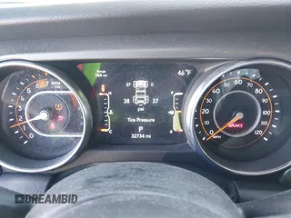 2023 Jeep Wrangler Sport S with VIN 1C4HJXDN0PW695795, listed as a IAAI auction lot 41974691 with 32,734 mi miles and . Bid and sale history available at DreamBid. Image 7.