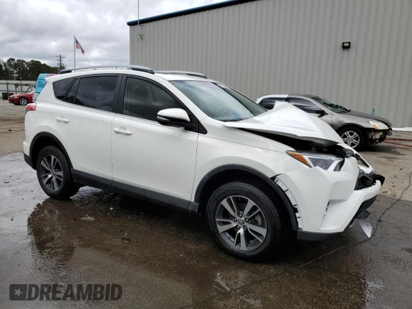 2018 Toyota RAV4 XLE with VIN JTMWFREV3JJ737450, listed as a Copart auction lot 50206255 with 7,805 mi miles and Salvage Title. Bid and sale history available at DreamBid. Image 4.