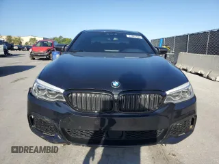 2018 BMW 5 Series M550i xDrive with VIN WBAJB9C52JB035913, listed as a Copart auction lot 51441195 with 42,205 mi miles and Salvage Title. Bid and sale history available at carsss.com. Image 5.