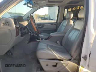 2006 GMC Envoy Denali with VIN 1GKET63M662228794, listed as a Copart auction lot 70802804 with 134,323 mi miles and Salvage Title. Bid and sale history available at DreamBid. Image 7.