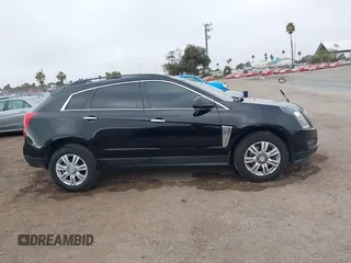 2015 Cadillac SRX with VIN 3GYFNAE37FS598023, listed as a IAAI auction lot 41198546 with 127,373 mi miles and . Bid and sale history available at carsss.com. Image 13.