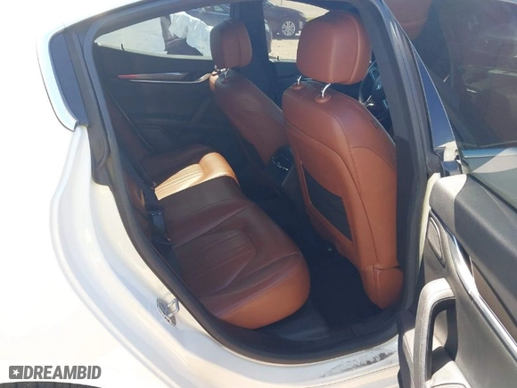 2015 Maserati Ghibli with VIN ZAM57XSA7F1155160, listed as a IAAI auction lot 41749868 with 107,304 mi miles. Bid and sale history available at carsss.com. Image 8.