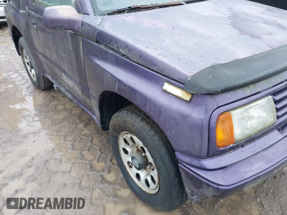 1993 Suzuki Sidekick z VIN 2S3TA01C4P6406238, wystawiony jako IAAI lot #41469419 z przebiegiem 126 667 mil mil oraz . Historia ofert i sprzedaży dostępna na DreamBid. Obrazek 6.