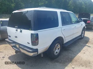 1998 Ford Expedition XLT with VIN 1FMRU176XWLB98732, listed as a IAAI auction lot 42593540 with 201,655 mi miles and . Bid and sale history available at DreamBid. Image 4.