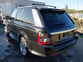 2012 Land Rover Range Rover Sport HSE Lux z VIN SALSK2D43CA752360, wystawiony jako IAAI lot #42041636 z przebiegiem 169 257 mil mil oraz . Historia ofert i sprzedaży dostępna na DreamBid. Obrazek 3.