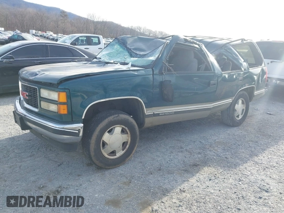 1998 GMC Yukon z VIN 1GKEK13R2WJ731178, wystawiony jako IAAI lot #41339082 z przebiegiem 291 604 mil mil oraz . Historia ofert i sprzedaży dostępna na DreamBid. Obrazek 2.