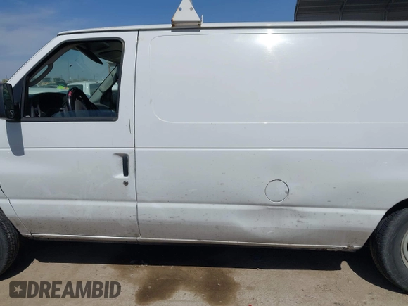 2004 Ford Econoline Cargo with VIN 1FTRE14W44HA29084, listed as a IAAI auction lot 41793350 with 123,429 mi miles. Bid and sale history available at carsss.com. Image 14.