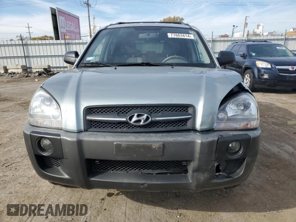 2009 Hyundai Tucson GLS with VIN KM8JM12B79U012399, listed as a Copart auction lot 77663414 with 164,615 mi miles and Salvage Title. Bid and sale history available at carsss.com. Image 5.