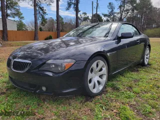 2005 BMW 6 Series 645Ci with VIN WBAEK73445B261180, listed as a IAAI auction lot 41768424 with 128,824 mi miles. Bid and sale history available at carsss.com. Image 2.